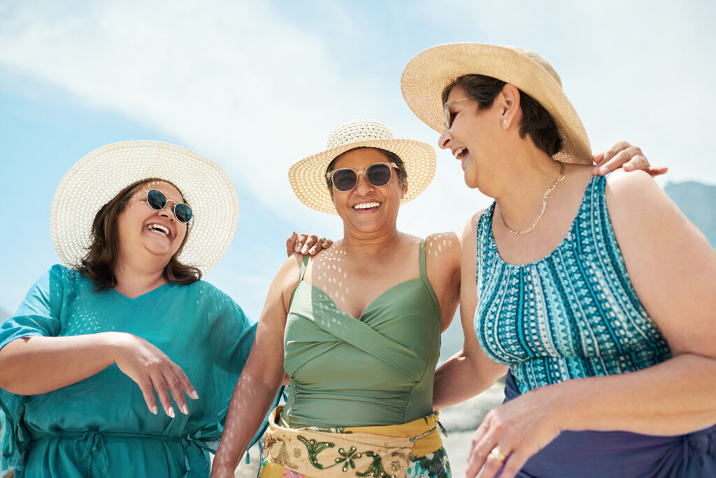 Women smiling after seeing a plastic surgeon in Bayport, Long Island