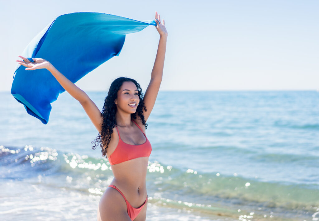 Confident woman after liposuction in NYC
