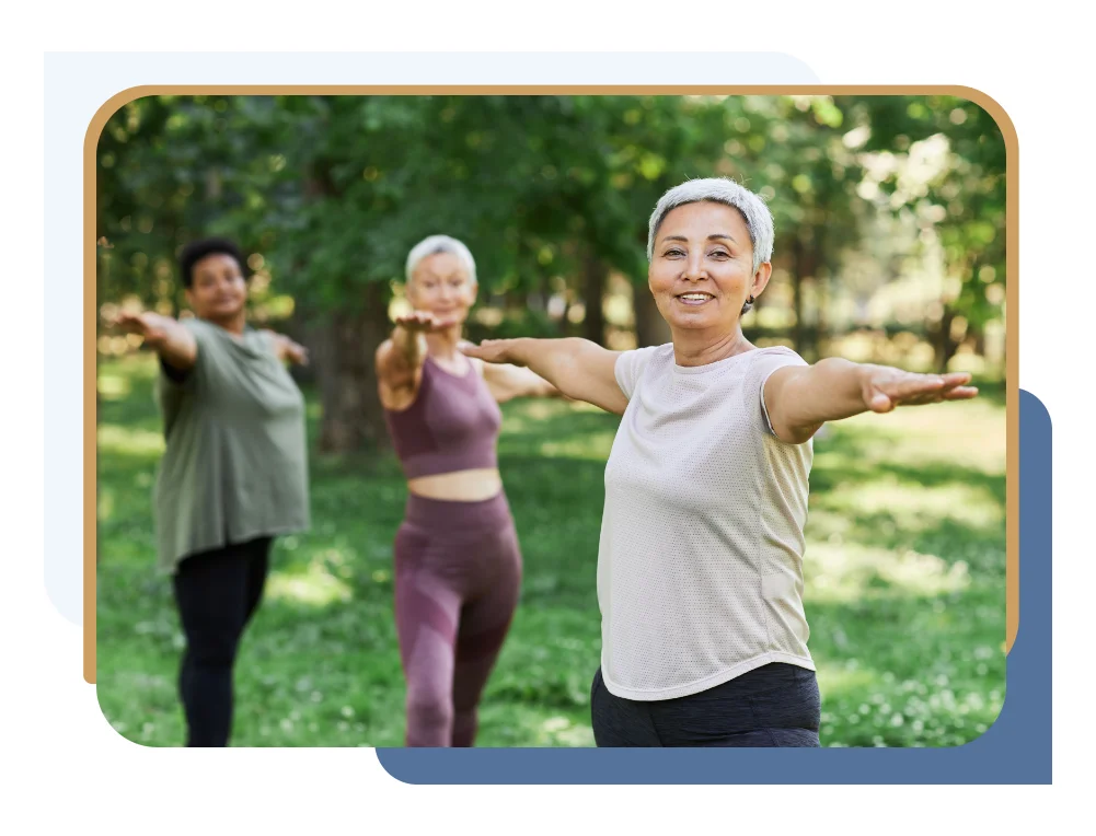 Women doing yoga outdoors after skin removal surgery