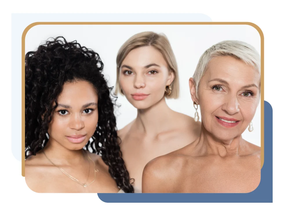 Three women of different ages posing against a white background