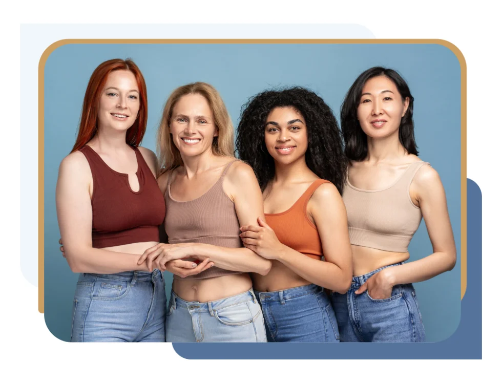 A group of women in crop tops posing for a photo