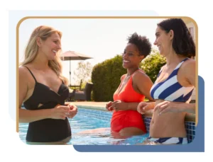 Women in swimwear in pool discussing body lift cost on Long Island vs NYC