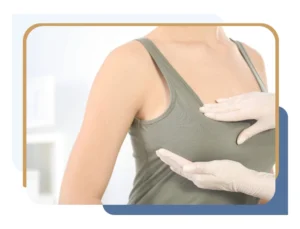 Plastic surgeon examining patient’s breasts and explaining breast reduction vs augmentation
