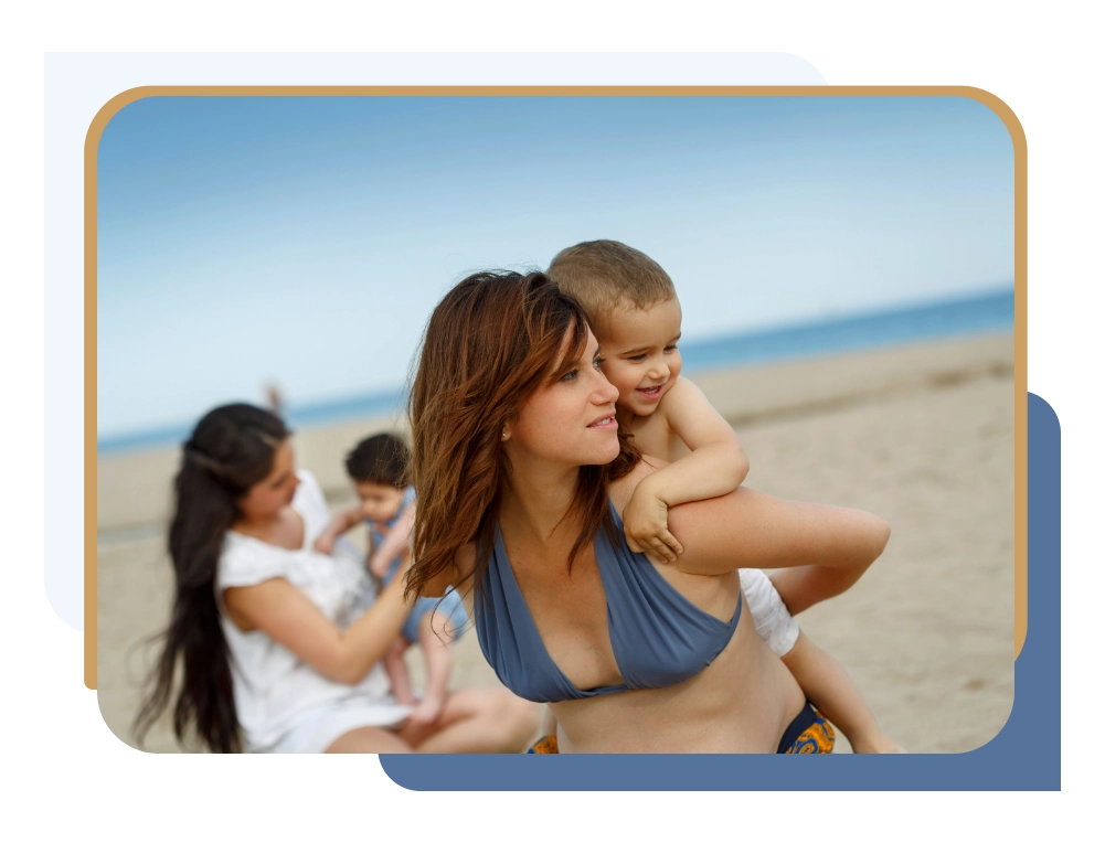 Mother and child spending time together at the beach