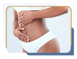 Image of female torso with hands on abdomen