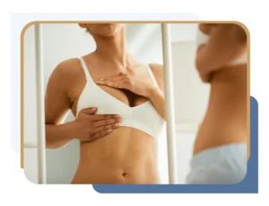 Women examining breast to determine whether she meets Aetna breast reduction requirements